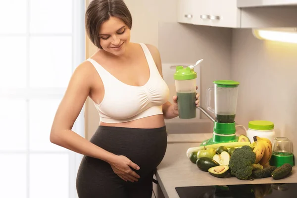 Young Pregnant Woman Holding Shaker Green Protein Cocktail Home — Stock Photo, Image