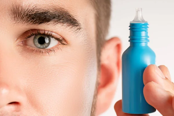 Closeup Male Eye Small Bottle Eyedrops — Stock Photo, Image