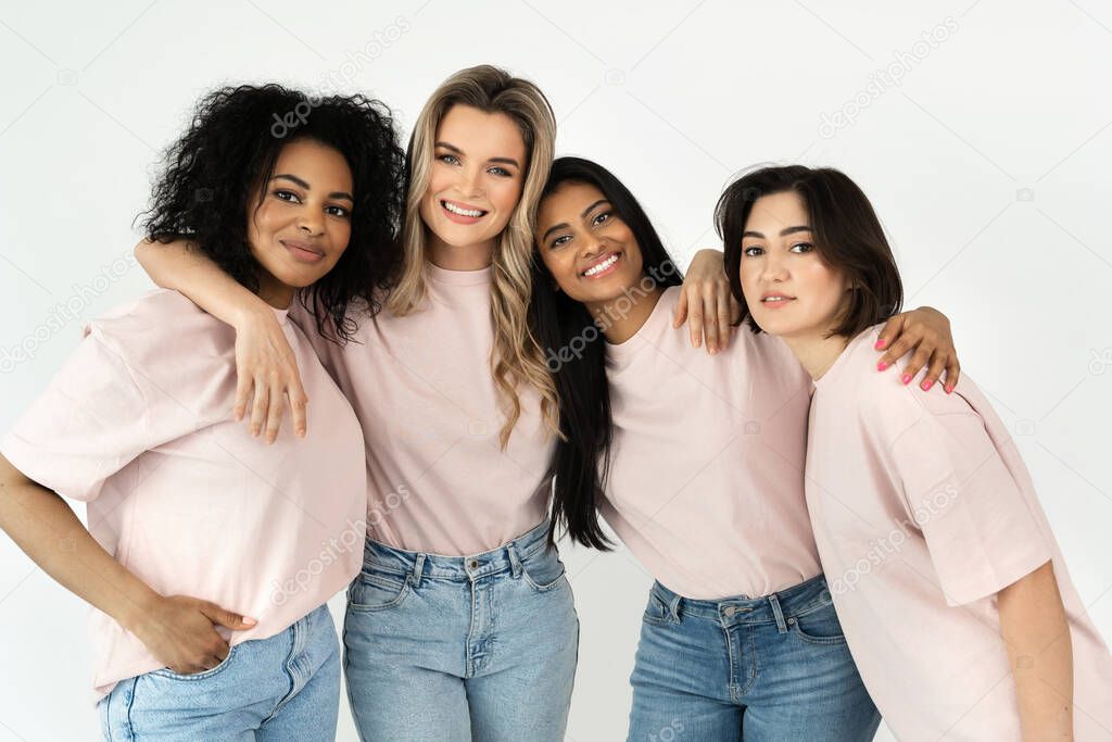 Group of different ethnicity women on gray background. Multicultural diversity and friendship. 