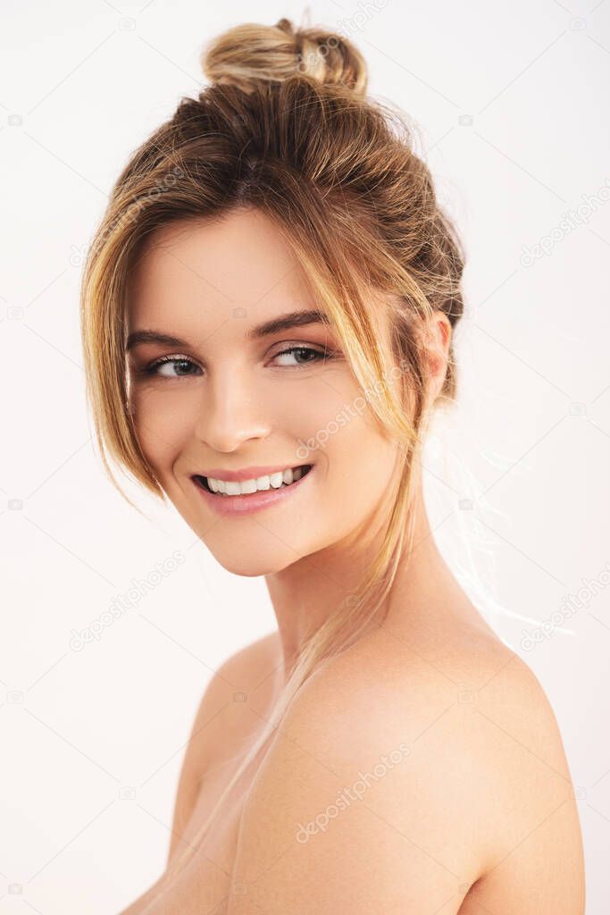 Portrait of young and pretty woman with a natural makeup