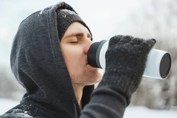 Young Man Athlete Drinking Thermal Mug Snowy Winter Day — Stock Photo, Image