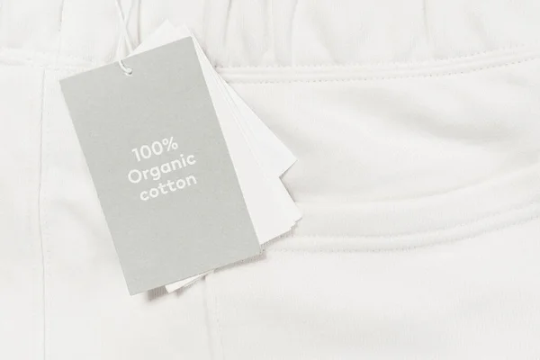 Gros Plan Étiquette Papier Sur Vêtement Blanc 100 Coton Biologique — Photo