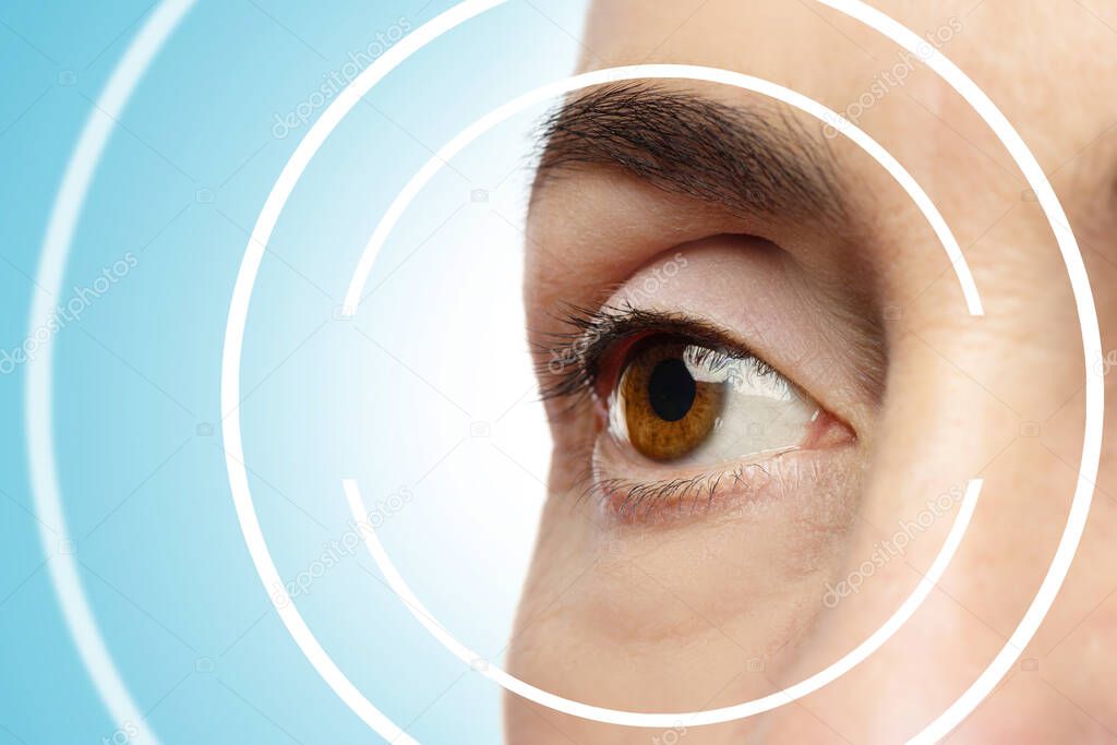 Close-up of female eye. Concepts of laser eye surgery or visual acuity check-up