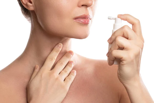 Woman Using Spray Analgesic Sore Throat Relief White Background — Stock Photo, Image