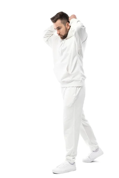 Schöner Mann Mit Weißem Kapuzenpulli Und Weißer Hose Auf Weißem — Stockfoto