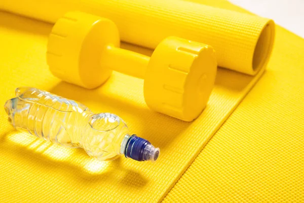Close Yellow Dumbbell Fitness Mat Bottle Still Water — Stock Photo, Image
