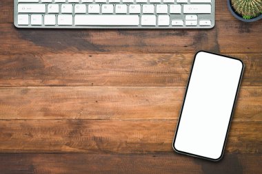 Akıllı telefon ofis tarzına sahip tablet bilgisayar dizüstü bilgisayarı üzerinde üst görünüm .