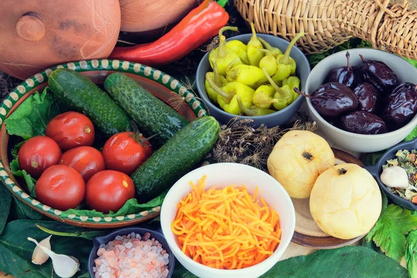 Various fermented food in bowls. Set of marinated products. Healthy food. Pickled vegetables.