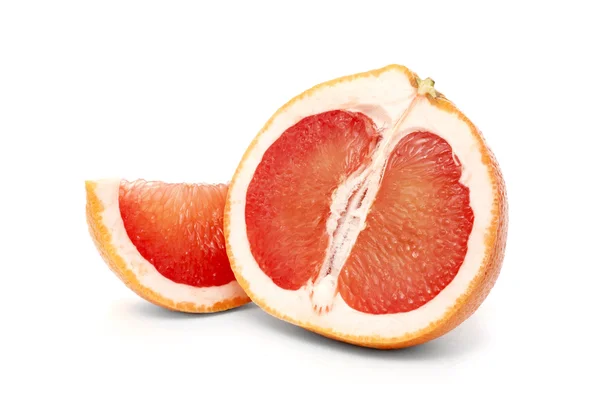 Grapefruithälfte mit einem Segment — Stockfoto