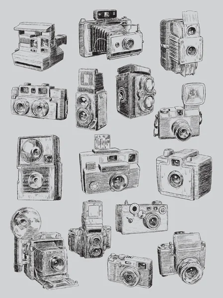 Conjunto de câmeras vintage esboçado — Vetor de Stock