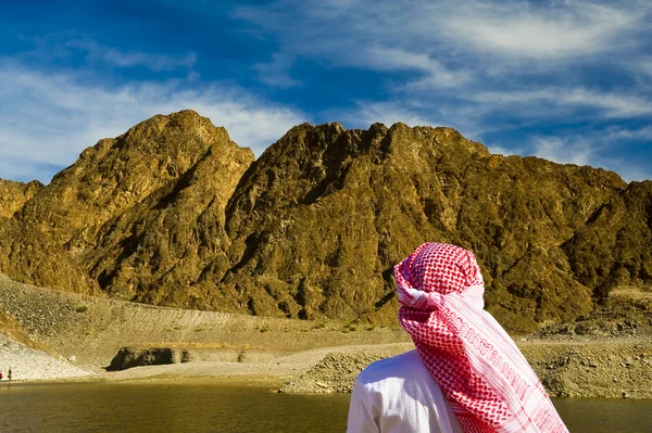 Arab watching the mountains