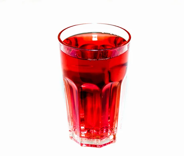 Glas met rode vloeistof Rechtenvrije Stockfoto's