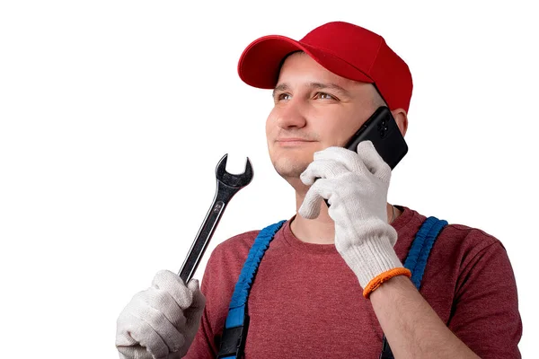 Handyman Wrench Phone White Background Work Uniform Cap Smile Concept — Fotografie, imagine de stoc