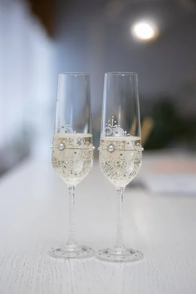 wedding glasses with champagne wine in the registry office at the ceremony. ideas for wedding agencie
