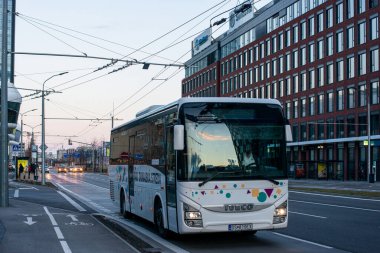 BRATISLAVA, SLOVAKIA - February 26, 2022. Bus Iveco Crossway Line 10.8M riding in the streets of Bratislava.