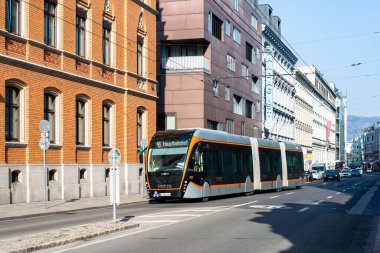 LINZ, AUSTRIA - MARCH 26, 2022. Trolleybus Van Hool Exqui.City 24 #228 riding with passengers in the streets of  Linz.
