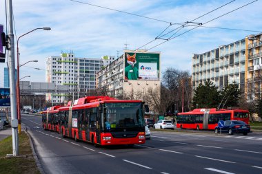 BRATISLAVA, SLOVAKIA - MARCH 03, 2022. Trolleybus Skoda 31Tr SOR #6803 riding with passengers in the streets of Bratislava.