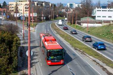 BRATISLAVA, SLOVAKIA - MARCH 03, 2022. Trolleybus Skoda 31Tr SOR #6821 riding with passengers in the streets of Bratislava.