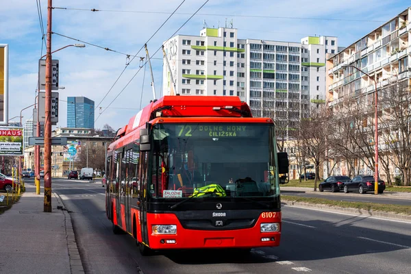 BRATISLAVA, SLOVAKIA - MARCH 03, 2022. Trolleybus Skoda 30TrDG SOR #6107 riding with passengers in the streets of Bratislava.