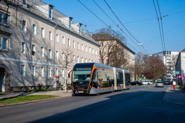 LINZ, AUSTRIA - MARCH 26, 2022. Trolleybus Van Hool Exqui.City 24 #236 riding with passengers in the streets of  Linz.