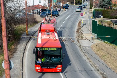 BRATISLAVA, SLOVAKIA - MARCH 03, 2022. Trolleybus Skoda 31Tr SOR #6834 riding with passengers in the streets of Bratislava.