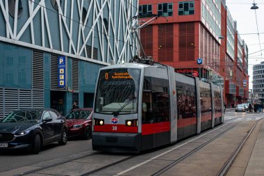 VIENNA, AUSTRIA - MARCH 05, 2022. Tram Siemens VLF-A #38 riding with passengers in the streets of Vienna.