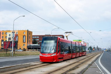 BRATISLAVA, SLOVAKIA - MARCH 04, 2022. Tram Skoda 29T1 #7407 riding with passengers in the streets of Bratislava.