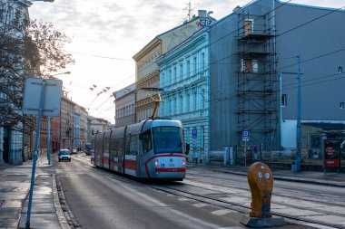 BRNO, CZECH REPUBLIC - February 25, 2022. Tram Skoda 13T Elektra #1905 riding with passengers in the streets of Brno.