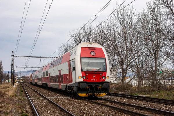 BRATISLAVA, SLOVAKIA - MARCH 07, 2022. Train Skoda Vagonka 471 #951 005-8 riding with passengers in the streets of Bratislava.