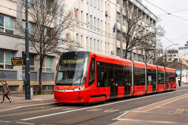 BRATISLAVA, SLOVAKIA - MARCH 07, 2022. Tram Skoda 30T1 #7512 riding with passengers in the streets of Bratislava.