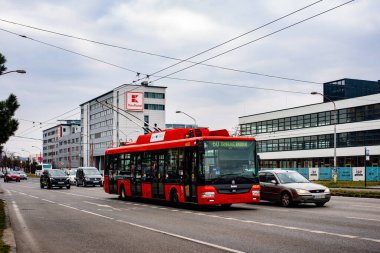 BRATISLAVA, SLOVAKIA - MARCH 07, 2022. Trolleybus Skoda 30Tr SOR #6035 riding with passengers in the streets of Bratislava.