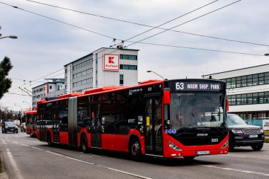 BRATISLAVA, SLOVAKIA - MARCH 07, 2022. Bus Otokar Kent C 18,75 #3323 riding with passengers in the streets of Bratislava.