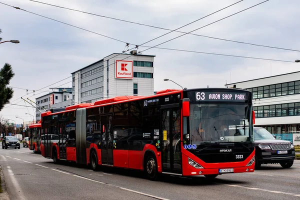 BRATISLAVA, SLOVAKIA - MARCH 07, 2022. Bus Otokar Kent C 18,75 #3323 riding with passengers in the streets of Bratislava.