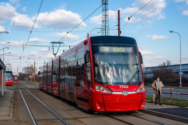 BRATISLAVA, SLOVAKIA - MARCH 07, 2022. Tram Skoda 30T0 #7502 riding with passengers in the streets of Bratislava.