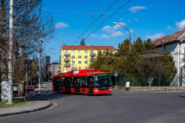 BRATISLAVA, SLOVAKIA - MARCH 08, 2022. Trolleybus Skoda 30Tr SOR #6021 riding with passengers in the streets of Bratislava.