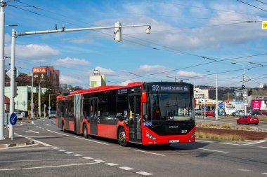 BRATISLAVA, SLOVAKIA - MARCH 08, 2022. Bus Otokar Kent C 18,75 #3327 riding with passengers in the streets of Bratislava.