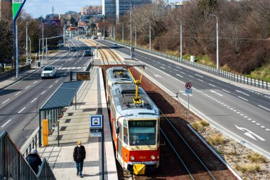 BRATISLAVA, SLOVAKIA - MARCH 07, 2022. Trams Tatra T6A5 #7941 and 7942 riding with passengers in the streets of Bratislava.