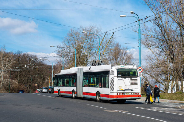 BRATISLAVA, SLOVAKIA - MARCH 08, 2022. Trolleybus Skoda 25Tr Irisbus #6705 riding with passengers in the streets of Bratislava.