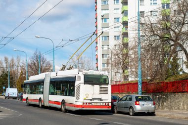 BRATISLAVA, SLOVAKIA - MARCH 08, 2022. Trolleybus Skoda 25Tr Irisbus #6701 riding with passengers in the streets of Bratislava.