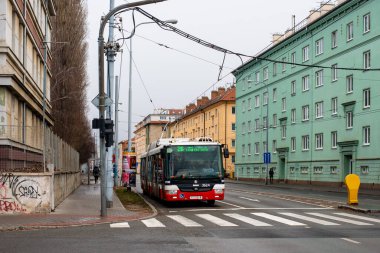 BRNO, CZECH REPUBLIC - February 25, 2022. Trolleybus Skoda 31Tr SOR #3624 riding with passengers in the streets of Brno.