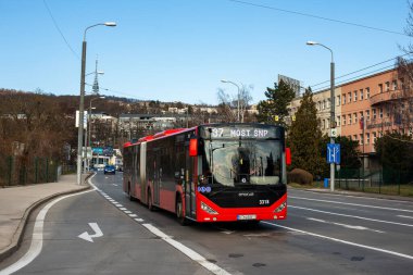 BANSKA BYSTRICA, SLOVAKIA - April 09, 2022. Trolleybus Skoda 14Tr #1001 riding with passengers in the streets of Banska Bystrica.