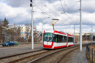 BRNO, CZECH REPUBLIC - February 25, 2022. Tram Pragolmex EVO 2 #1827 riding with passengers in the streets of Brno.