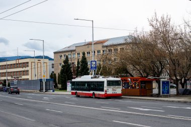 BANSKA BYSTRICA, SLOVAKIA - April 09, 2022. Trolleybus Skoda 30Tr SOR #3003 riding with passengers in the streets of Banska Bystrica.