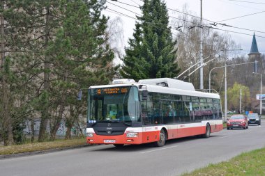 BANSKA BYSTRICA, SLOVAKIA - April 09, 2022. Trolleybus Skoda 30Tr SOR #3003 riding with passengers in the streets of Banska Bystrica.
