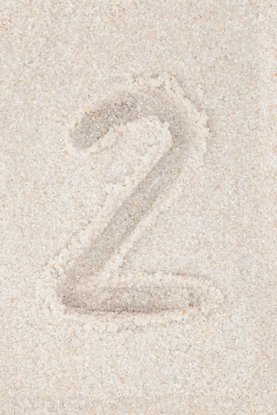 Concept backgrounds - Numbers on sand — Stock Photo, Image