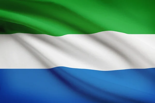 Series of ruffled flags. Republic of Sierra Leone. — Stock Photo, Image