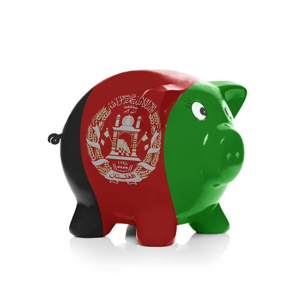 Piggy bank with flag coating over it - Afghanistan — Stock Photo, Image