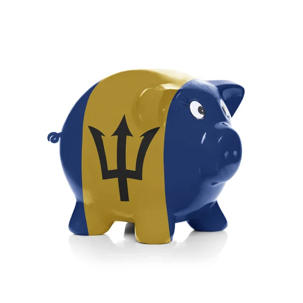 Piggy bank with flag coating over it - Barbados — Stock Photo, Image