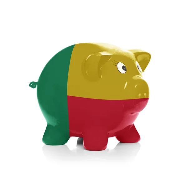 Piggy bank met vlag coating overheen - benin — Stockfoto