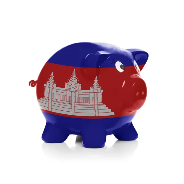 Sparschwein mit Flagge Beschichtung drüber - Kambodscha — Stockfoto